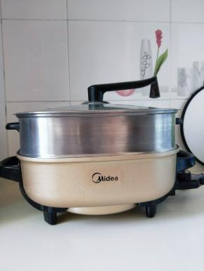 启动蒸锅，大火烧开转中火18分钟，关火焖8分钟。（蒸鱼的时间也要根据鱼的大小来增减）