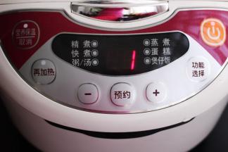 盖上电饭煲的盖子、按精煮键就可以了