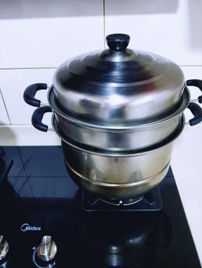 发至明显比原来大了，开中火蒸15分钟，关火焖3分钟。