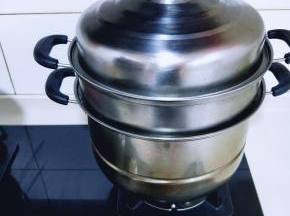 发至明显比原来大了，开中火蒸15分钟，关火焖3分钟。