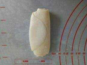 取一个松弛好的卷按扁