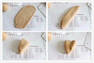 取第一个包完的，擀开牛舌状，左右对折，再上下对折，从中间位置切开，尖角部位不要切通。