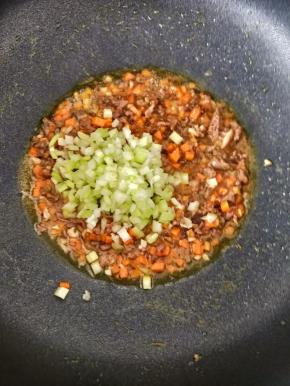 接着放入西芹丁，翻炒均匀即可。