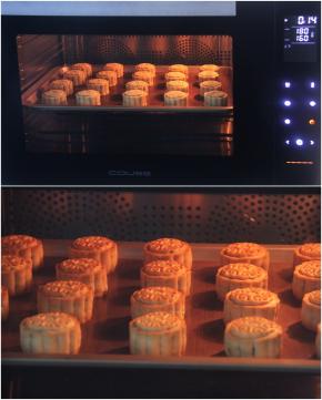 月饼重新放入烤箱，温度转为上火180度，下火160度，继续烘烤约15分钟。月饼烤至表面金黄色腰部有点鼓出的状态即可。