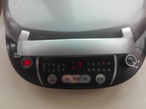 盖好盖子，设置牛排功能转水煎包功能