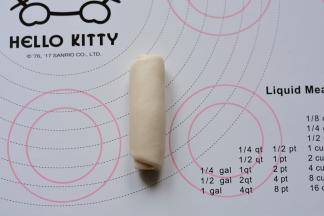 然后从上往下推卷，收口朝下，