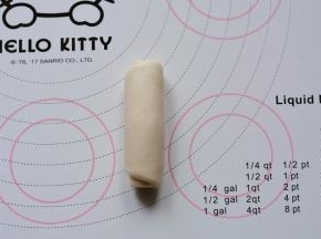 然后从上往下推卷，收口朝下，