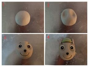 灰灰: 灰色面团包馅后滚圆，压出眼窝，嘴巴，粘好眼睛鼻子，耳朵参考阿奇的耳朵做法，绿色面团做帽子，用剪刀剪出鬃毛的样子，粘到脸部两侧