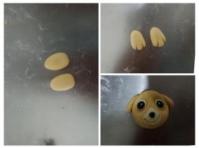 各1.5克面团搓成水滴状，压扁，用刮板压出纹路，做天天的耳朵，如图将鼻子眼睛耳朵都粘好
