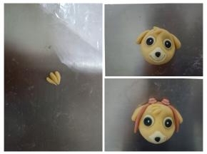 适量橘色面团搓小水滴，粘到天天的额头部位，红色面团做出飞行眼镜来