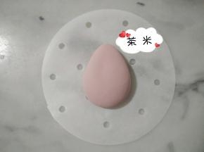 搓成水滴状，稍微按扁。