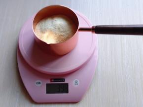 再将奶粉称重！