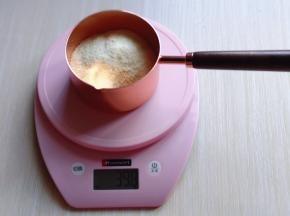 再将奶粉称重！