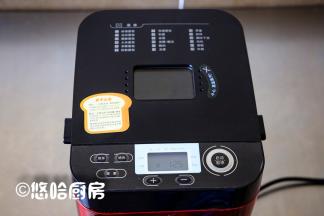 启动面包机的年糕程序，默认时间是1小时25分钟，按启动开始烹饪。