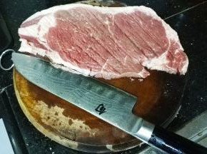 用刀背敲薄一点