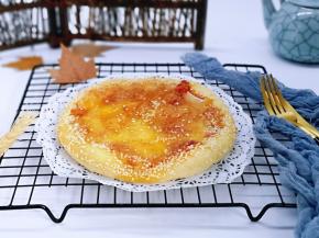 戴上隔热手套取出烤盘。