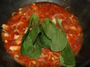 放入油菜。