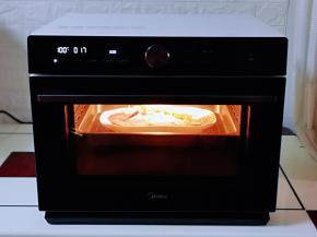 选择鲜嫩纯蒸功能，自动温度为100度，时间为20分钟，蒸烤箱结束工作后焖5分钟再打开！