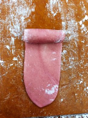 再次由上往下卷起。