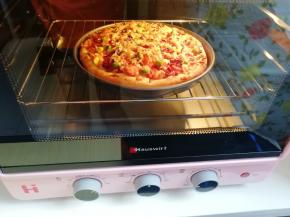 披萨马上就要出炉啦！满屋子的香味。