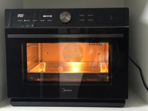 6.预热美的烤箱200度