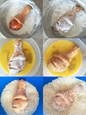 当鸡腿腌制到一定的时间时，打开保鲜膜，把腌制调料在往鸡腿上裹一裹，取一个先裹玉米淀粉，把鸡腿放到玉米淀粉里，打几个滚，淀粉裹均匀后用同样的方法去滚鸡蛋，之后是面包糠。然后依次放到不沾烤盘上。【给鸡腿裹淀粉的时候可以预热烤箱，200度10分 钟。】