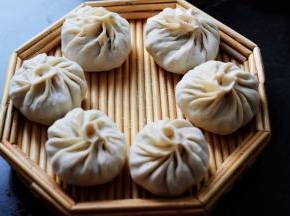 依次包好所有的包子后。