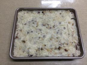 9.把炒好的料移入11寸烤盘中，整理平整