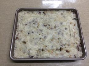9.把炒好的料移入11寸烤盘中，整理平整