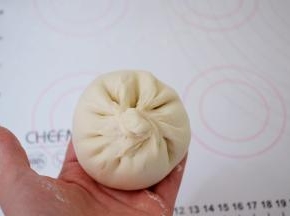 像包包子那个包好