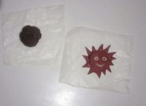 余下的带色面团分别做了一朵乌云，一个太阳