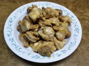 捞出控干油备用