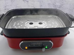 放上蒸屉，打开开关拉到最高的加热位置。