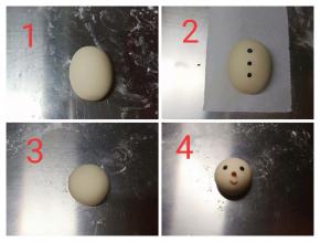 20克和25克白色面团分别做雪人的头和身体，头揉成圆的，身体揉成椭圆的，如图做出造型