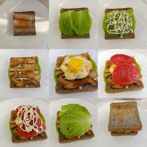 下面铺一块保鲜膜，放吐司片，放生菜，挤沙拉酱，放鸡胸肉，鸡蛋，培根火腿片，再挤一些沙拉酱盖上生菜，最后再盖一片吐司