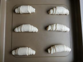 从宽处往下卷起，收口朝下