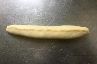 再次对折，并把口捏紧。一定要捏紧收口，不然会在二发后涨开。