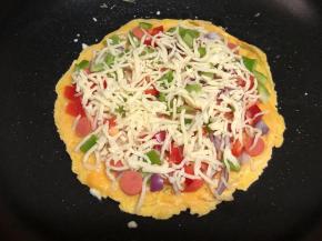 铺上马苏里拉奶酪丝。