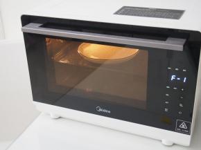 按菜单按钮，F-1就是蒸米饭功能，默认的时间设置是50分钟，将其调整至30分钟即可