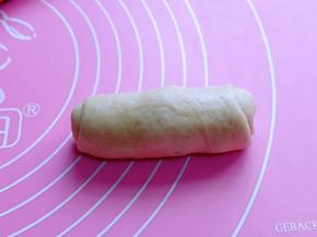 由上往下卷起来。