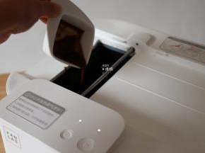 再根据提示放入调好的调味汁，点开始按钮；