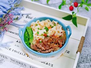 盛出装入碗中，撒上葱花。