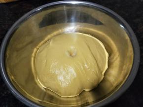 盖上湿布放温暖处发酵至两倍大，不塌陷，不回缩