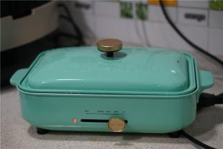 然后上盖，转大火焖煮至收汁。