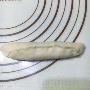 从上端卷至下磁端，尽量卷紧，收紧收口。