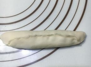 从上端卷至下磁端，尽量卷紧，收紧收口。