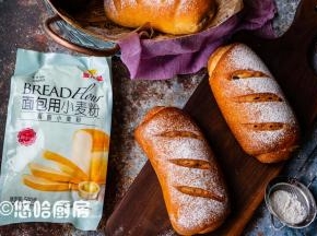 若看到面团上色过深，可以在上面盖一层锡纸，烘烤结束后面包放网架放凉。