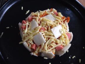 最后再撒上一层芝士碎