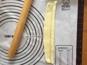 从一头卷起