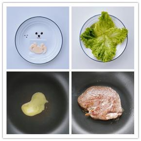 5. 刻图案：将浣熊的图案画在油纸上，用刻刀在奶酪片上刻出浣熊脸部的图案，将海苔剪出眼睛、鼻子和耳朵的图案，放在一边备用。
6. 将洗净的生菜叶铺在盘中。
7. 煎牛排：把平底不粘锅烧热，小火融化一半量的黄油。
8. 把菲利牛排放入锅中，煎至八成熟，盛出稍晾凉。